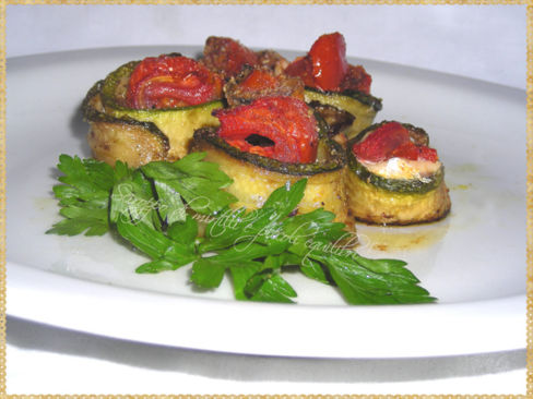 Rotolini di zucchine con alici e pomodorini