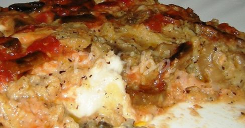 Pasticcio di polenta taragna e sugo ai funghi