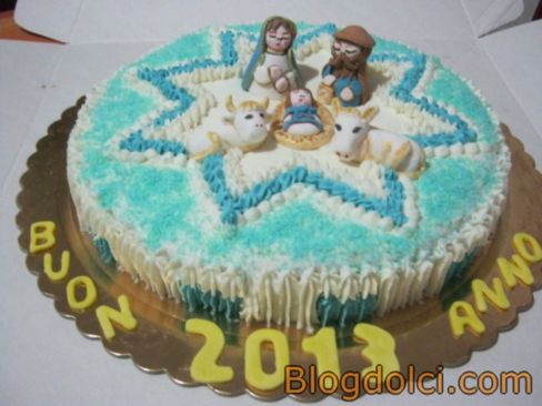 Torta con presepe e con auguri per il nuovo anno