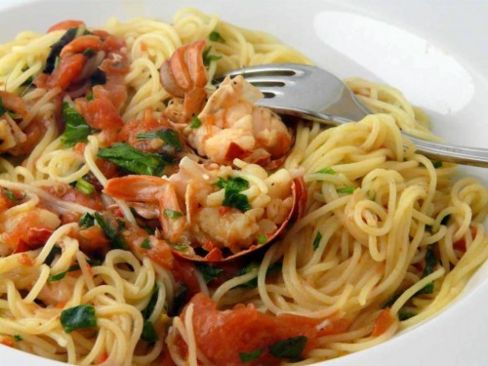 Spaghetti all'astice con pomodori