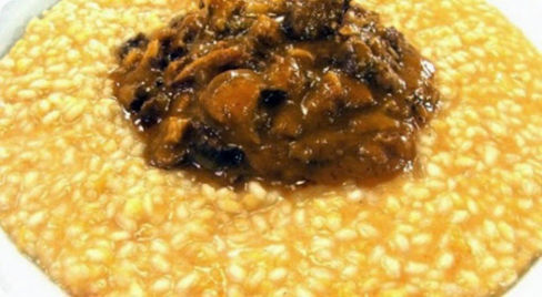 Risotto con la zucca e ragù di costine.