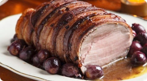 Lonza arrosto lardellata all'uva