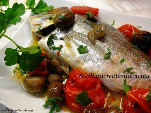 Orata al forno con pomodori e olive